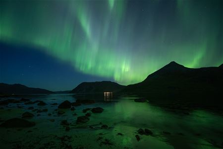 The Northern Lights behind the mountain