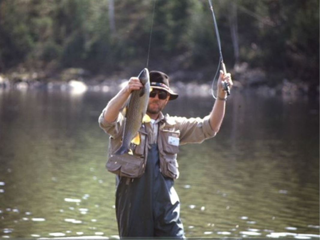 A fisherman is fishing.