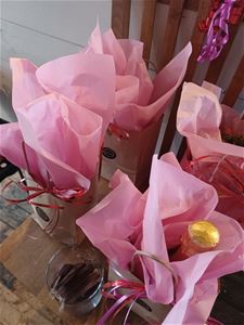 Presentförpackningar i rosa i närbild
