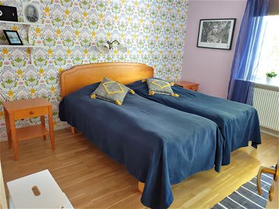 Double bed in a wooden frame. 