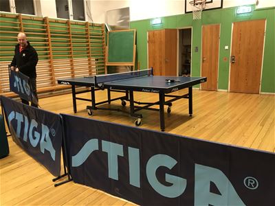 Ping pong table in a gymnastic hall. 