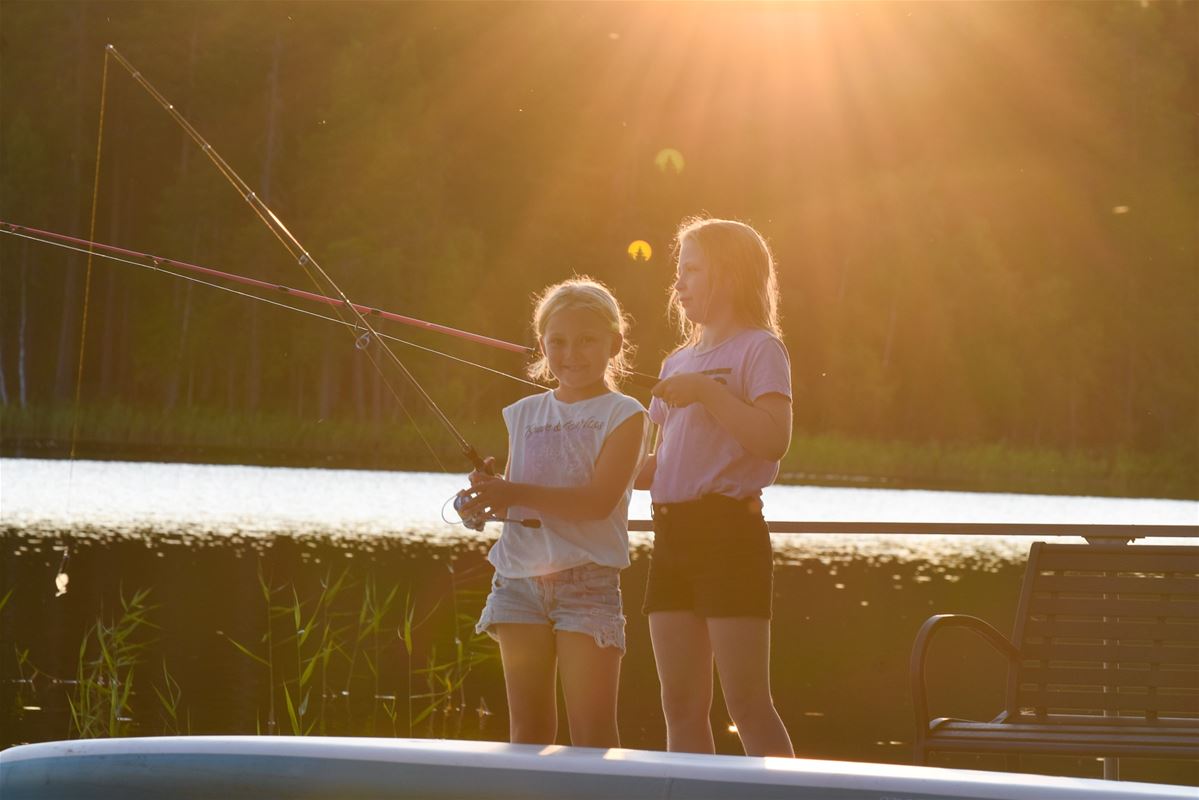 Two girls fishing. 