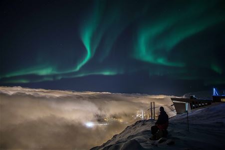 Northern lights over Tromsø seen from the Cable Car