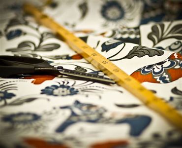 Fabric with Dala horse motif.