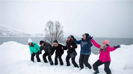 Guests dance in the snow