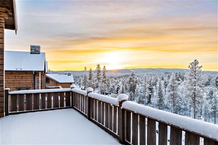 A balcony with winter landscape