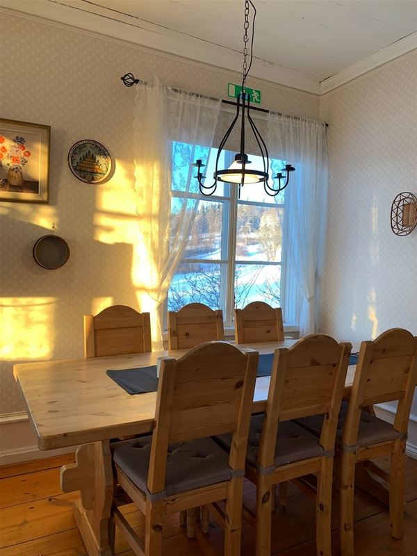 Kitchen table with six chairs.