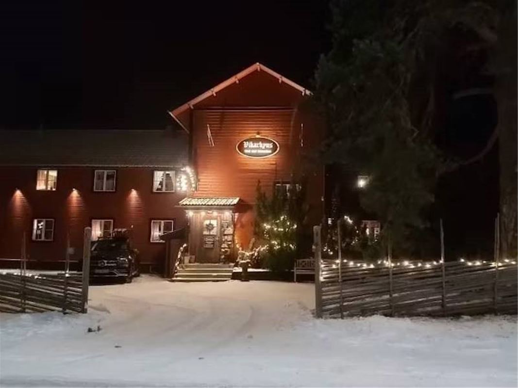 Lightened house in winter. 