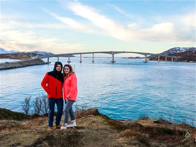 Couple in front of the Sommarøy bridge