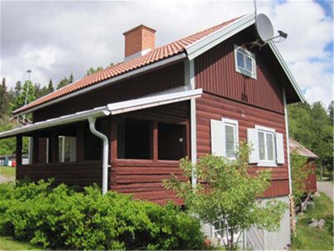 Cottage in Bjursås with repainted exterior and a veranda.