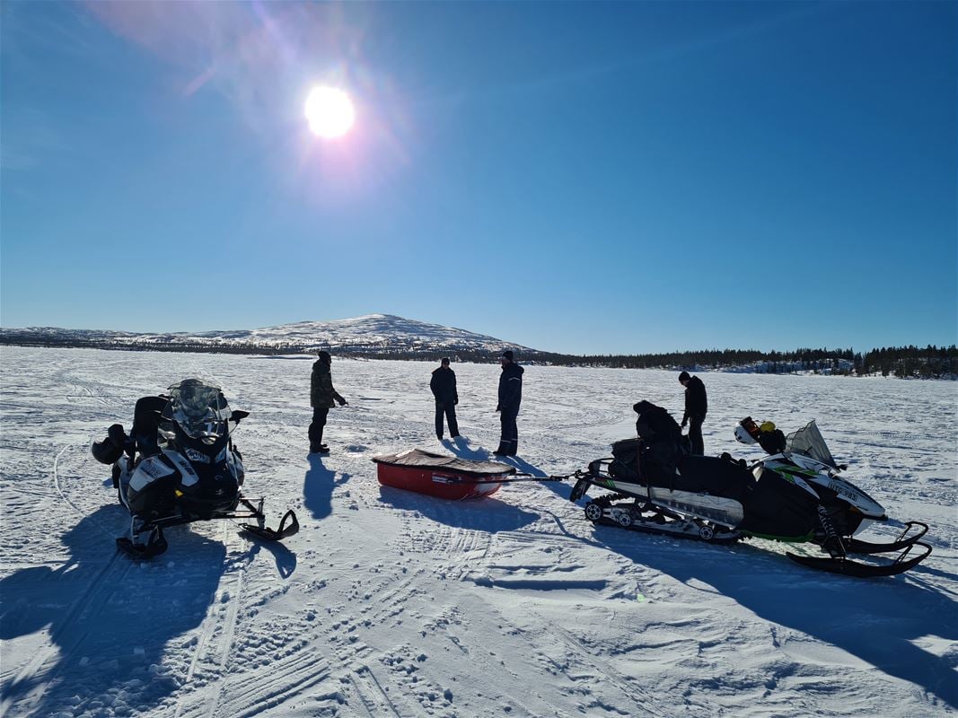 Snowmobiles in the ice. 