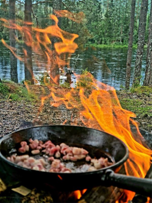 Cooking over open fire. 