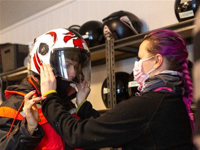 Guest checking if helmet fits