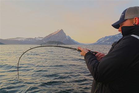 Man fishing with Explore the Arctic