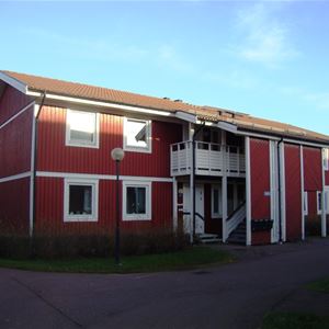 Exterior of redpainted house.