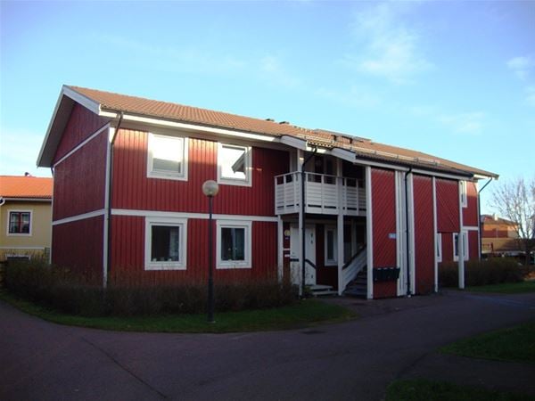 Exterior of redpainted house. 