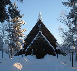 A chapel with lots of snow