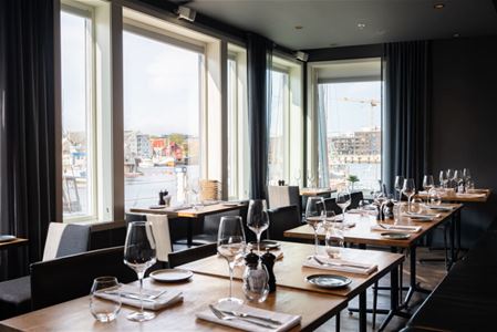 Meeting room with decked tables in Scandic Ishavshotell in Tromsø.