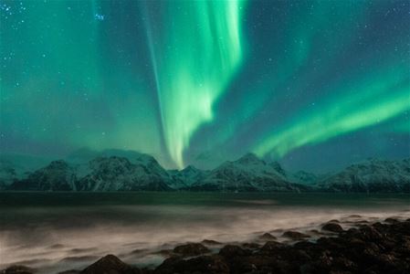 Northern lights, sea and mountains in the Tromso region